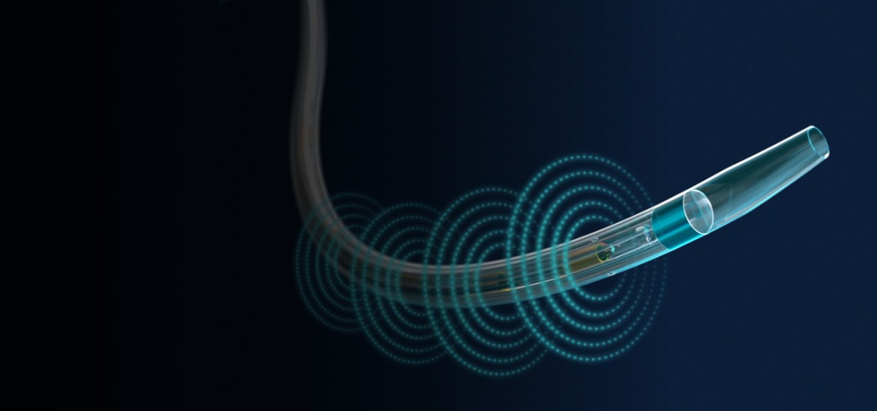 Close-up of EKOS Endovascular System catheter, with ultrasonic pulses emanating from it.