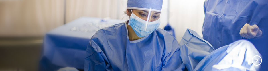 Female physician in surgery. 