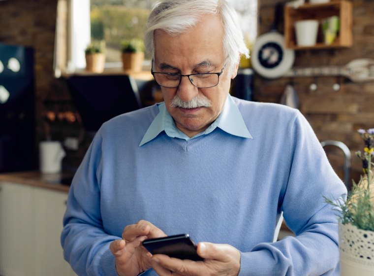 Man looking at his mobile device